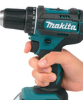 Badass Compact 18V Cordless Driver Drill Body Only Equipped With Heavy Duty Metal Gears And Twenty Two Clutch Settings Providing Knockout Torque For Serious Job Site Grind held in hand, showing grip and adjustable settings.