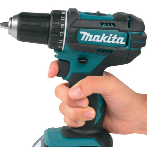 Badass Compact 18V Cordless Driver Drill Body Only Equipped With Heavy Duty Metal Gears And Twenty Two Clutch Settings Providing Knockout Torque For Serious Job Site Grind held in hand, showing grip and adjustable settings.