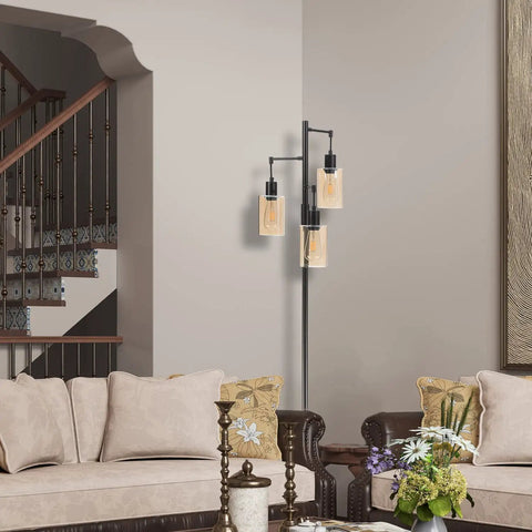 Living room with Dimmable 3-Light Oil Rubbed Bronze Farmhouse Floor Lamp With Amber Glass Shades next to a sofa