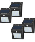 4-pack Solar Motion Sensor Outdoor Lights 30 LED with motion activated security lighting, black exterior wall and gutter sconce