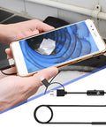 Phone Borescope Endoscope with 6 LED Lights and 3.3ft Cable in use, showing clear drain image on smartphone screen.