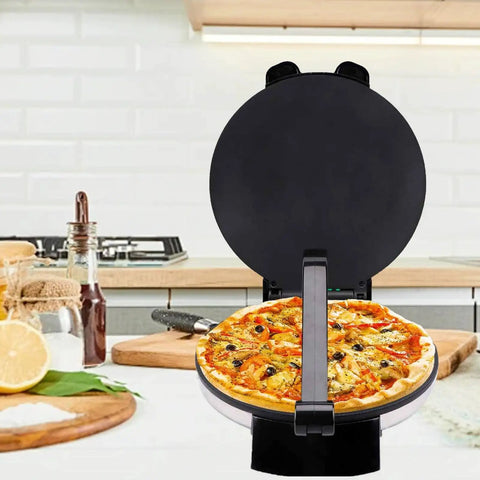 Heavy Duty Electric Tortilla Press 10 Inch Non Stick Roti Maker With Adjustable Heat Control cooking pizza on kitchen countertop.