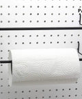 Extendable Pegboard Paper Towel Holder For Standard Pegboard Boss Shop Ready Fits 1/8 And 1/4 Inch Hole Spacing Holds Rolls Up To Seven Inch Diameter And Fourteen Inch Length Heavy Duty Metal With Black Finish Two Pack mounted on pegboard