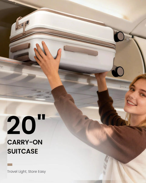 Person placing 20-inch white carry-on luggage in overhead bin, featuring USB charging port, TSA lock, and spinner wheels.