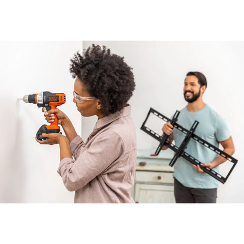 Person using 20V Max Matrix Cordless Drill And Driver Kit With Battery Included, Quick Connect System for home improvement project.