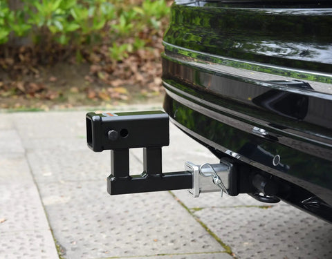 1-1/4 To 2 Inch Hitch Adapter With 4-1/4 Inch Rise Or Drop, 3500 Lbs GTW, Includes Pin And Clip, attached to vehicle