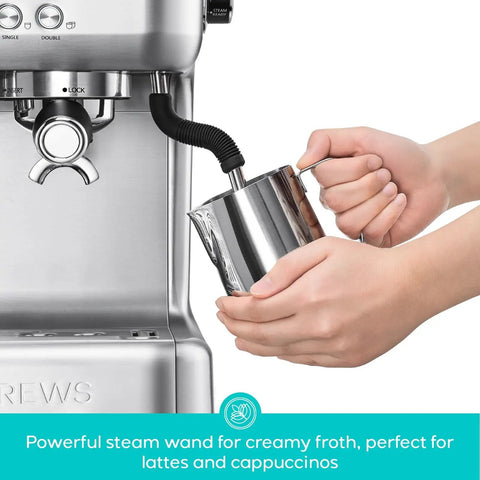 Daily Grind Premium Stainless Steel Espresso Machine With Reliable Built In Grinder And Manual Steam Wand For Killer Lattes And Effortless Morning Rituals At Home, showing steam wand in use.