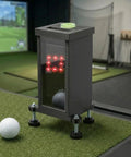 Beefy Protective Case For Golf Launch Monitor With Polycarbonate Shield High Impact Protection Adjustable Height Stand And Heat Dissipation For Indoor Outdoor Sim Setup in a golf simulator room