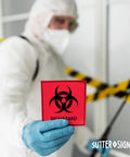 Heavy Duty Biohazard Stickers And Warning Decals Built Tough For Labs And Hospitals Includes Straight Up Essential Durable Vinyl Labels In A Solid Pack Of Ten For Zero Hassle Safety. Lab worker holding red biohazard warning decal.