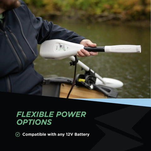 Person holding the handle of a 62lb Thrust Transom Mounted Saltwater Electric Trolling Motor with LED Battery Indicator on a boat.
