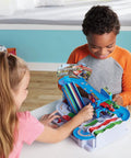 Children playing with Mario Kart Racing Deluxe Obstacle Course Set With Dual Lane Track And Lap Counter Includes Mario And Luigi Kart Figures Easy Assembly Six Obstacle Challenges Multiplayer Ready For Ages Five And Up Perfect Family Party Game Gift