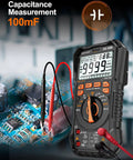 Digital Multimeter With Auto Range, 9999 Counts displayed, measuring capacitance on circuit board