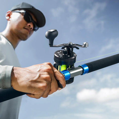 Angler using Chaos Pro Baitcasting Fishing Reel With CNC Machined Aluminum Unibody 25Lb Max Drag Level Wind Magnetic Braking outdoors