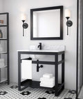Hardwired Satin Brass Wall Sconce With Cylinder Glass Shade beside bathroom vanity, transitional style