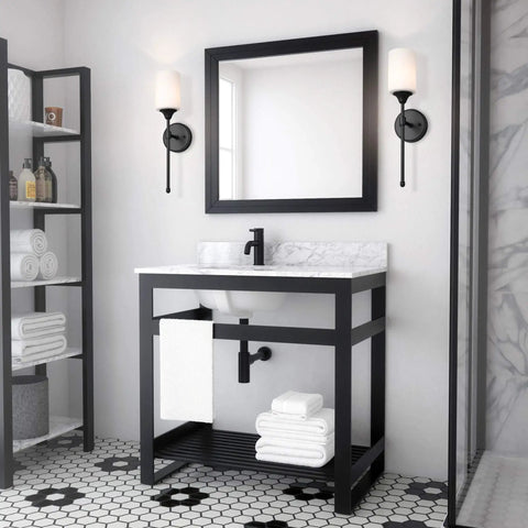 Hardwired Satin Brass Wall Sconce With Cylinder Glass Shade beside bathroom vanity, transitional style