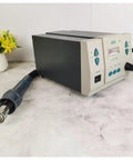 Front view of Powerful Pro-Grade 1000W Soldering And Hot Air Rework Station with digital temperature display on table.