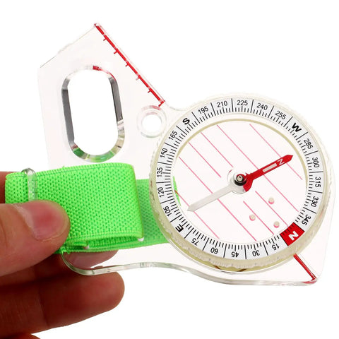 Portable Hiking Compass Thumb Orienteering Tool With Precision Acrylic Construction showing green strap detail