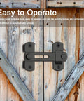 Two Pack Barn Door Lock Set With 180 Degree Flip Sliding Latches installed on wooden barn door, black finish