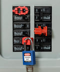 120V Snap On Breaker Lockout Red Pack Of 6 For Electrical Safety And Lockout Compliance in use on black circuit breakers