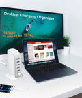 40W USB Charging Hub Workhorse With Five Ports And Type C 3A Desktop Wall Charger Tower on desk with laptop and plants