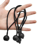 Hand holding 50 Pack 6 Inch Bungee Cords With Balls For Camping Tents Tarps Canopies And Outdoor Gear Elastic String Ties UV Resistant