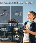 Child using Black Hawk Style RC Helicopter With 2 Batteries And 26 Minute Flight Time Indoor Flying Toy For Kids And Adults