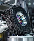 XHX Pin Tires For 1.3 Inch Wheels Fit TRX4M And SCX24 Rock Crawlers, 72x24 Mm, S5 Compound Delivering Mad Traction On Rugged Terrain, Precise Handling, And All Terrain Confidence For Off Road Adventures mounted on a wheel with detail view