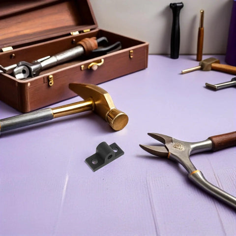 Heavy Duty Aluminum Corner Bracket Set for Extrusion Frames amidst various tools on a purple surface