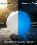 Solar Floating Pool Lights 2 Pack 14 Inch Auto Color Changing LED Light Balls Waterproof Inflatable Lights for Pools Ponds Gardens Patios and Epic Backyard Parties and Weddings shown glowing at dusk