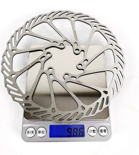 Beefy G3 Stainless Steel Disc Brake Rotors 160mm 180mm 203mm 2 Pack with Bolts displayed on digital scale