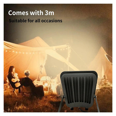 JUDYSSY New Led Floodlight Three-Color Light Adjustable Brightness Spotlight showing adjustable design at a campsite.