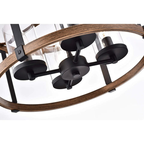 Close-up view of Akua Imitation Wood Grain Matte Black Four Light Drum Chandelier With Metal Frame And Glass Accents For Warm Modern Vibe ETL Listed Requires Four 60 Watt E12 Bulbs Not Included showing underside and bulb fittings.
