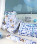 Blue Teddy Bear Hot Air Balloon Baby Wrapping Paper Roll For Baby Boy Birthday And Baby Shower Mini Roll displayed on gifts