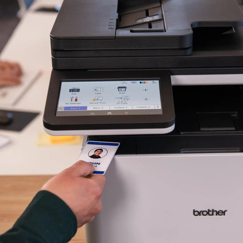 Person using security card on Color Laser All In One Printer With Duplex Printing, Scan And Copy, Fast 33 Pages Per Minute