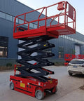 Heavy Duty Self Propelled Scissor Lift With 26 Foot Electric Aerial Work Platform And 450 Kilogram Load Capacity in operation outdoors.