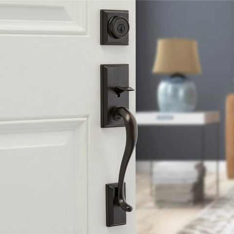 Hawthorne Front Door Lock Set With Deadbolt And Exterior Handleset, Venetian Bronze Finish featured on door.