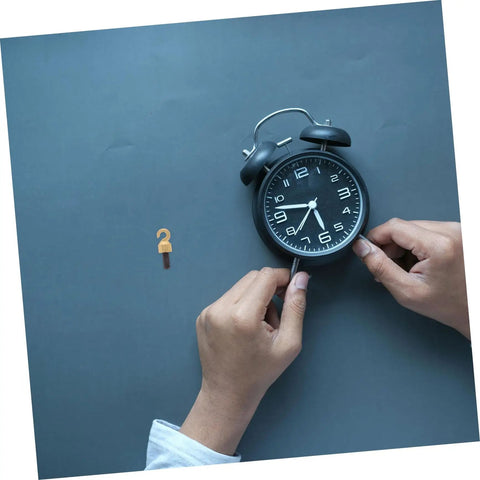 Person adjusting clock hands beside Grandfather Clock Weight Replacement Hook for DIY restoration projects with secure chain operation.