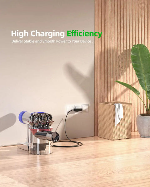 Replacement Charger For Cordless Vacuum V6 V7 V8 Compatible With charging Dyson vacuum against wall in modern room.