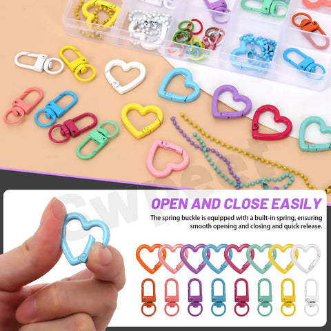 All In One 68 Piece DIY Jewelry Making Kit With Colorful Swivel Lobster Claw Clasps Heart Shaped Keychain Clips Ball Chains Open Jump Rings And Carabiner Clips In A Compact Storage Box For Easy Crafting, shown with heart clasps and ball chains