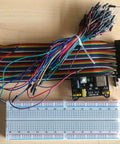DIY Breadboard Kit With Power Supply Module And 65 Jumper Wires 40 Pin 20 Cm Leads Pro Grade Prototyping For 3.3V And 5V Electronics Starter Friendly For Class Lab Or Home Projects Portable And Easy To Use with breadboard, power module, and jumper wires