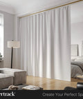 Ceiling Mounted Curtain Rail 20 Ft Satin Brass Track For Curtains And Room Dividers, Privacy Panels, Offices, Classrooms, Hospitals And More, USA Made Heavy Duty Ceiling Track System For Home Or Business Use installed above white curtains in bedroom