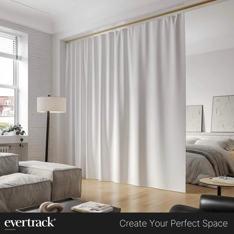 Ceiling Mounted Curtain Rail 20 Ft Satin Brass Track For Curtains And Room Dividers, Privacy Panels, Offices, Classrooms, Hospitals And More, USA Made Heavy Duty Ceiling Track System For Home Or Business Use installed above white curtains in bedroom