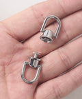 4 Pieces Silver D Rings For Purses With 360 Rotatable Ball Head Buttons And Screws Metal Hardware For DIY Leather Craft Bag Making Accessories Heavy Duty Hardware Built To Last In Daily Bag And Leather Projects, silver D rings in hand