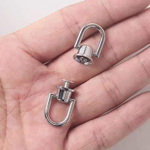 4 Pieces Silver D Rings For Purses With 360 Rotatable Ball Head Buttons And Screws Metal Hardware For DIY Leather Craft Bag Making Accessories Heavy Duty Hardware Built To Last In Daily Bag And Leather Projects, silver D rings in hand
