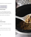 Total Game Changer Slow Cooker And Instant Pot Cookbook Featuring One Hundred Twenty Seven Easy Dinner Recipes For Busy Weeknights And Healthy Meal Prep Ideas To Fuel Your Daily Grind Like A Pro, showing cooked grains in a white spoon.