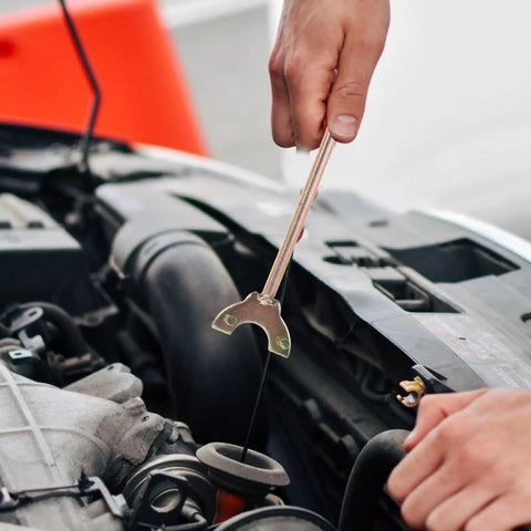 Person using Auto AC Compressor Repair Tool Set 3 Piece Disassembly Kit for quick compressor removal under the hood.