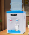 Compact 110V 550W Portable Countertop Water Dispenser With Hot And Cold Water Tiny Desk Side Hydration Station in use