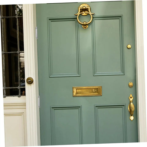 Heavy Duty Double Action Spring Hinge 2Pack Stainless Steel Cafe Saloon Door Hardware on blue door with brass fixtures.