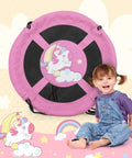 40 Inch Pink Unicorn Saucer Swing for Kids With Adjustable Ropes and 2 Carabiners, shown with a child sitting nearby