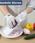 Person wearing Versatile Pro Grade ANSI Level 8 Cut Resistant Gloves With Stainless Steel Thread Reinforced Fibers cutting onion with mandolin.
